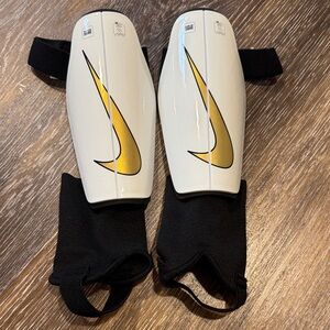 Nike White and Gold Soccer Shin Guards
